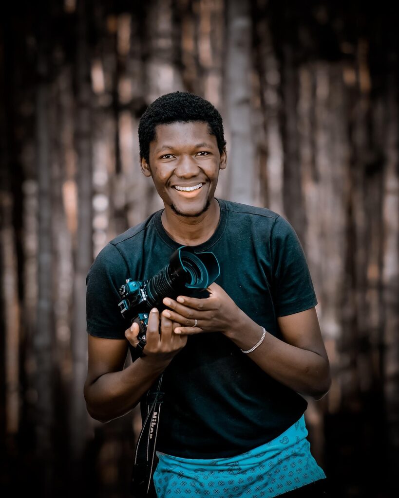 man, model, camera, photographer, lens, equipment, smile, african american, happy, holding, woods, african american, african american, african american, african american, african american